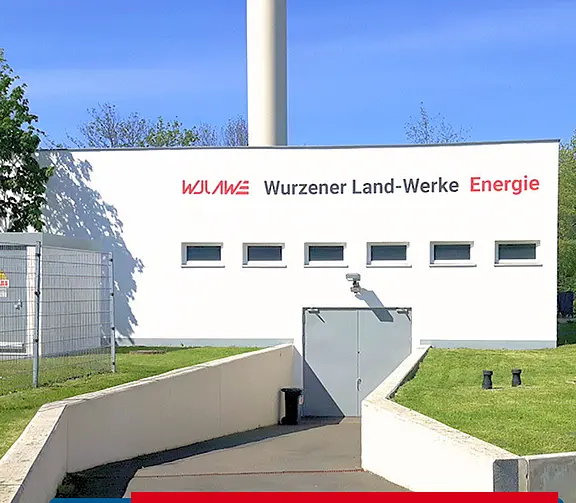 Betriebsgebäude der Wurzener Land-Werke Energie. Hinweis auf die digitale Leitungsauskunft und die Anbindung an Leico.